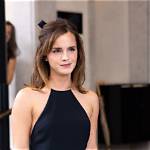 Emma Watson's French Messy Bun Is Giving 'Bridgerton' Vibes