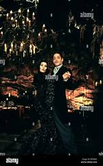 Raul Julia and Anjelica Huston: a Timeless Connection in Cinema