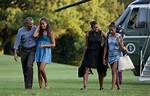 The Real Story Behind the Obama Kids' Parents