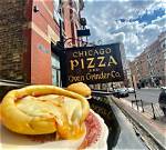 Unveiling Chicago's Oven Grinder Pizza: a Culinary Gem